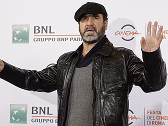 Eric Cantona leaps to defend h...
