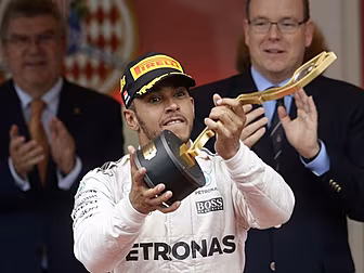 Lewis Hamilton takes first win...