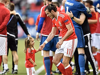 Wales charged by UEFA over bri...