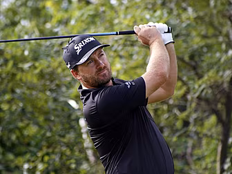 Graeme McDowell facing uphill...