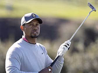 Tiger Woods misses the cut at...