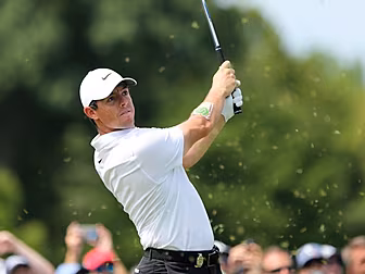 Rory McIlroy determined to pla...