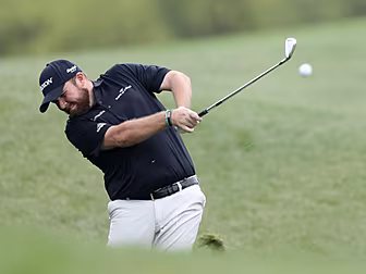 Shane Lowry struggles as Rory...