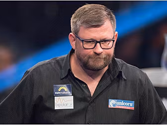 James Wade crashes out as vete...