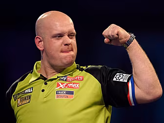 Michael van Gerwen advances to...