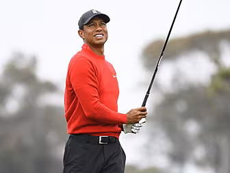 Tiger Woods and caddie sued by...