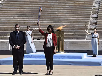 Olympic Flame handover ceremon...