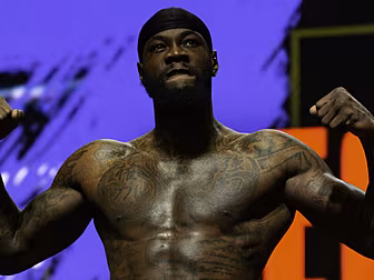 Deontay Wilder reveals bicep s...