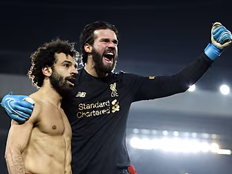 Liverpool's Alisson back in tr...
