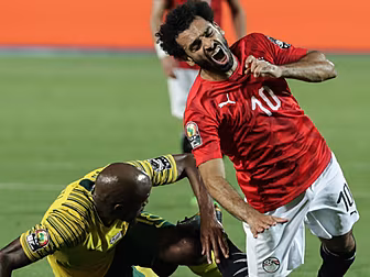 Liverpool's Mo Salah tests pos...