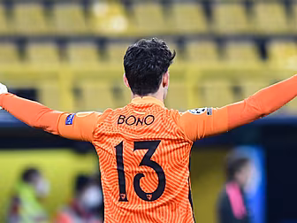 Sevilla goalkeeper Bono scores...