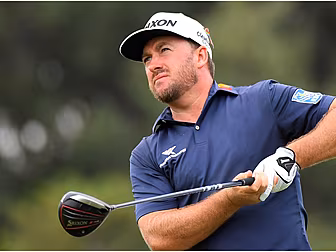 McDowell three off the lead at...