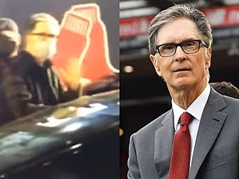 Liverpool's John Henry dodges...
