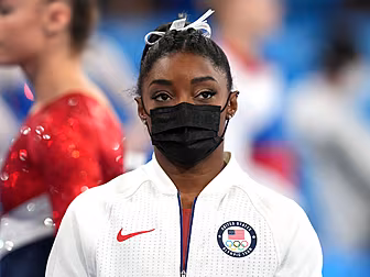 Simone Biles withdraws from Th...