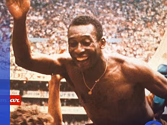 Brazilian legend Pelé passes a...