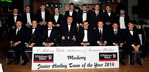 The Muskerry Junior Hurling Team of 2014 pictured with JJ Long, Muskerry GAA Chairman, and Barry Walsh, of sponsors OMahony, Walsh Auctioneers and Insurance Brokers.