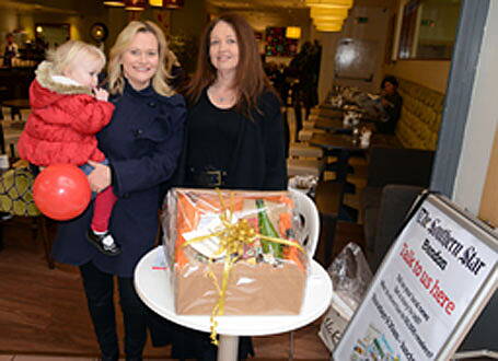 Caroline collecting her hamper from Jackie in Bandon today.