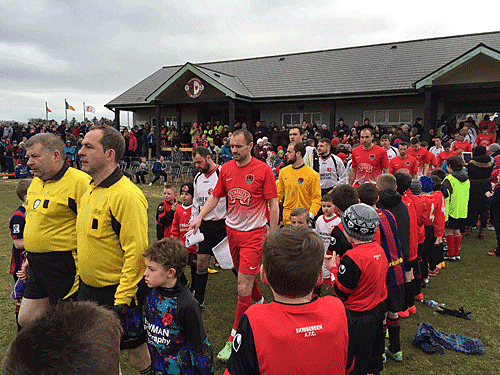 Teams walk out onto the field ahead of Cork City v Skibbereen on Saturday afternoon.