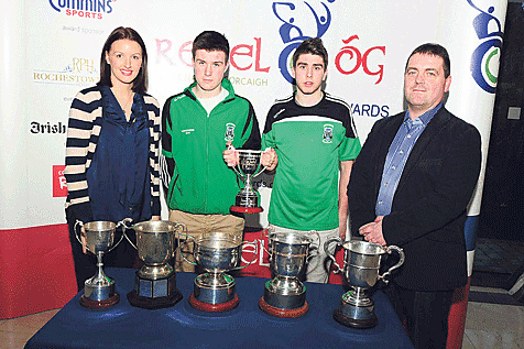 Cups that cheer: Ilen Rovers U14 football captain Matthew Bushe and minor football captain Sean ODonovan receive the Cork Rebel &Oacute;g award from Mary Claire Cummins and Aidan Horgan, representing sponsors Cummins Sports.  