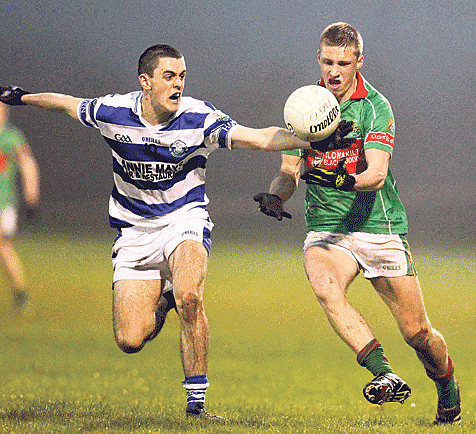 We meet again: Castlehavens Shane Kearney takes the ball away from Clonakiltys Sean White during the 2014 Clona Milk U21 A football championship final at Dunmanway that Clon won comfortably.