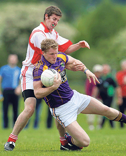 On the comeback traik: Carberys Ruairi Deane, pictured in action against Seand&uacute;ns last year, played his challenge first game on Monday night since his cruciate injury last July. 