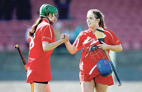 Job well done: Corks Hannah Looney and Orla Cronin (Ballineen) celebrate at the final whistle of Sundays Irish Daily Star League Division 1 semi-final win against Limerick in Charleville.       