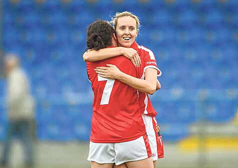 Great times: Nollaig Cleary celebrates another Cork win with her teammate Geraldine OFlynn.