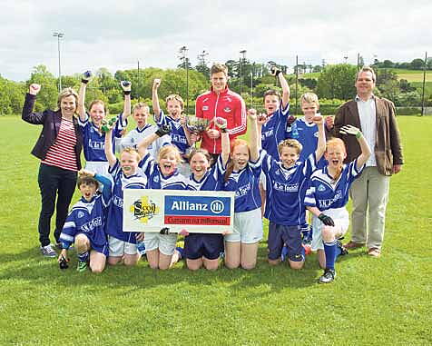 Time to party! Reigning champions Togher celebrate after winning the West Cork Sciath na Scol Roinn 10 mixed seven-a-side final against Cappabue, 4-2 to 3-0. See pages 14-15 for more.