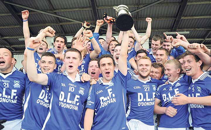 Boys in blue! Kilmeen celebrate their emphatic victory over Grange in the county junior B football  championship final at P&aacute;irc U&iacute; Rinn.