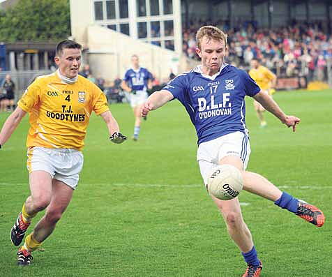 On target: Kilmeens Damien OGorman scores a cracking goal before Granges Brian 