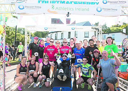 Race organiser Bob Hilliard gives the thumbs up with Team Hoyt at the beginning of the marathon in Courtmacsherry.  