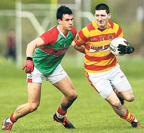 Flashback to 15 weeks ago: Newcestowns Daniel Twomey is challenged by Clonakiltys Thomas Clancy during the Cork county senior football championship round one game at Dunmanway last May.(