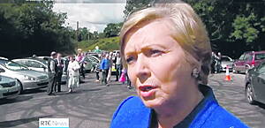 Justice Minister Frances Fitzgerald speaking on the RTE News last Sunday evening, with the doughnuts clearly visible in the background