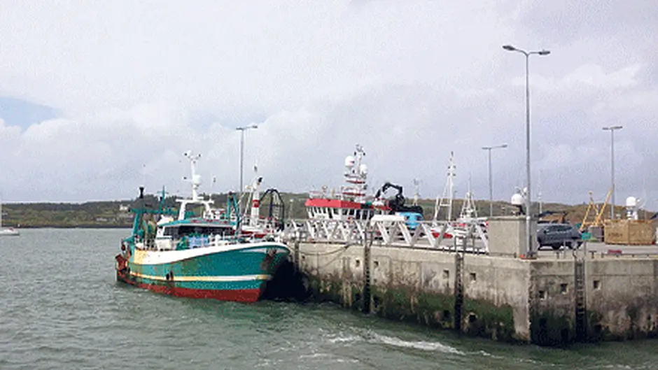 Lifeboats difficult shout to recover trawler Image