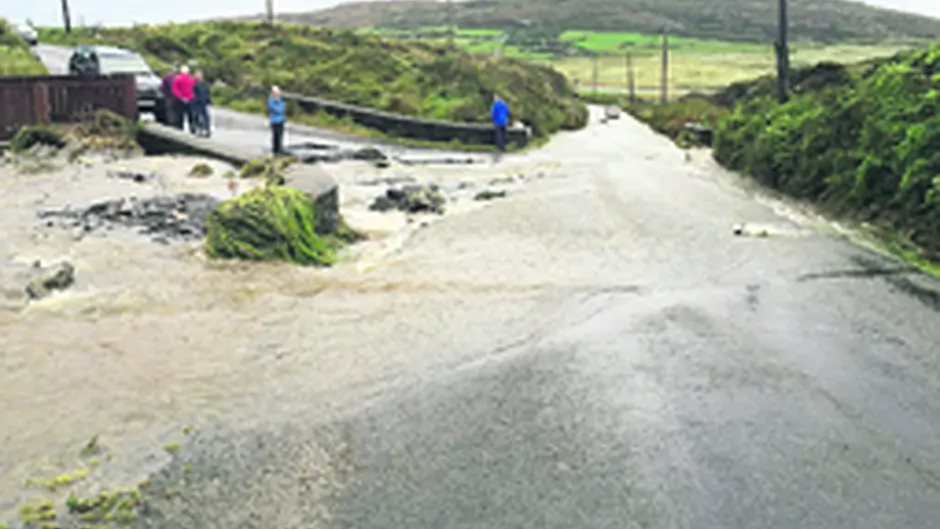 Driver and kids have a lucky escape in flooding Image