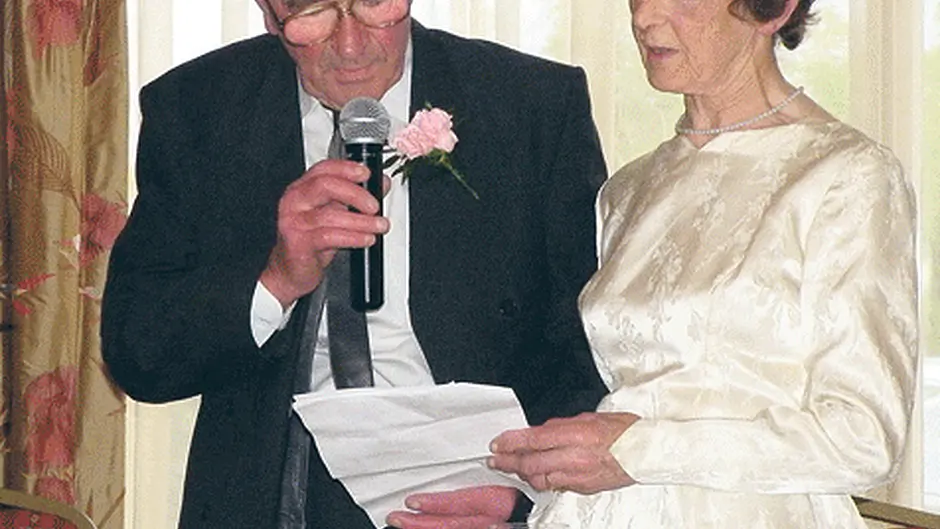 Wedding dress still fits the bride 50 years later Image