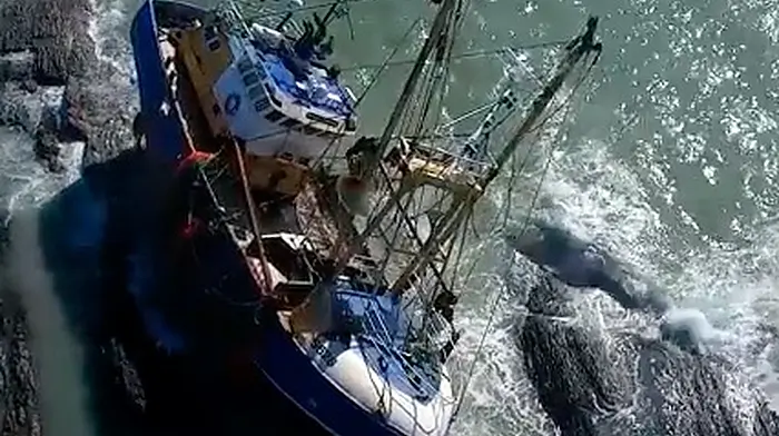 Spectacular drone footage of abandoned trawler on rocks in Kinsale Harbour Image