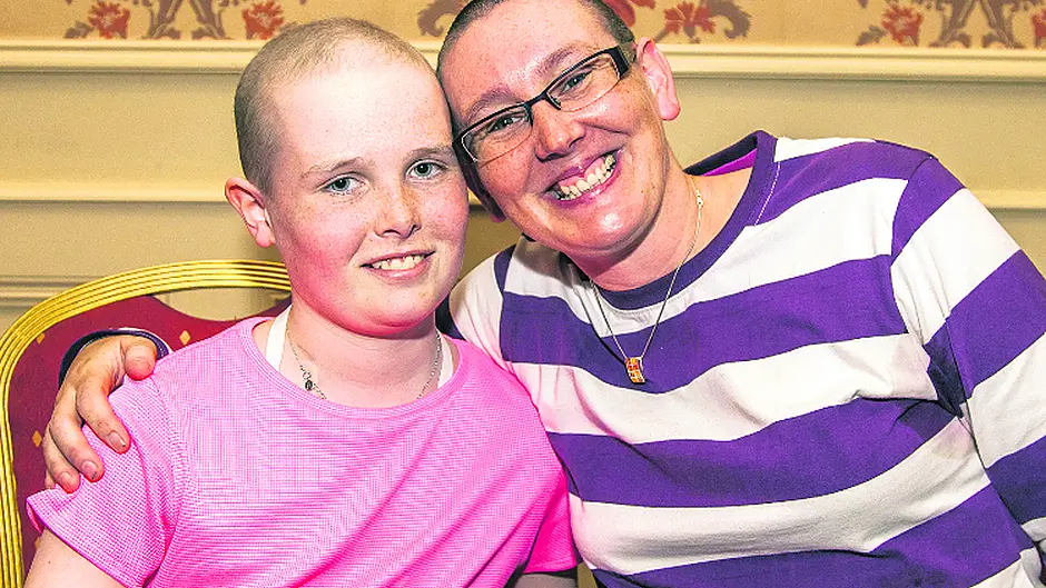 Aoife's coach shaves head in solidarity Image