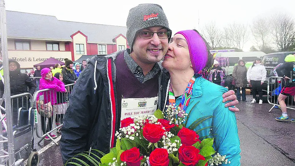 A marathon proposal for his childhood sweetheart Image