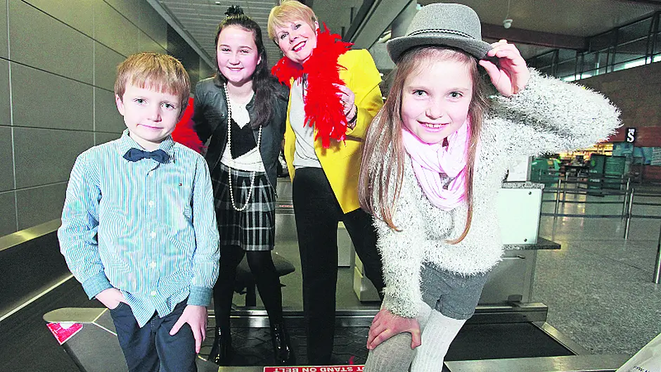 Airport staff hit the runway for fashion show Image
