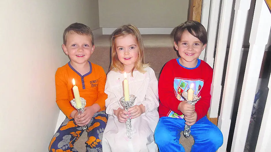Glowing in the same ‘Candlelight' as their parents Image