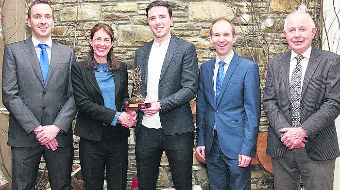 County champs host fundraising auction for team holiday Image