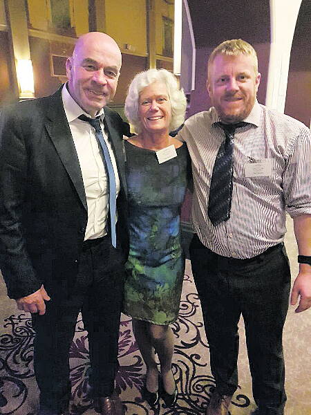 Steve Redmond, with one of the award organisers and Noel Browne, who this week swam the Staits of Gibraltar.