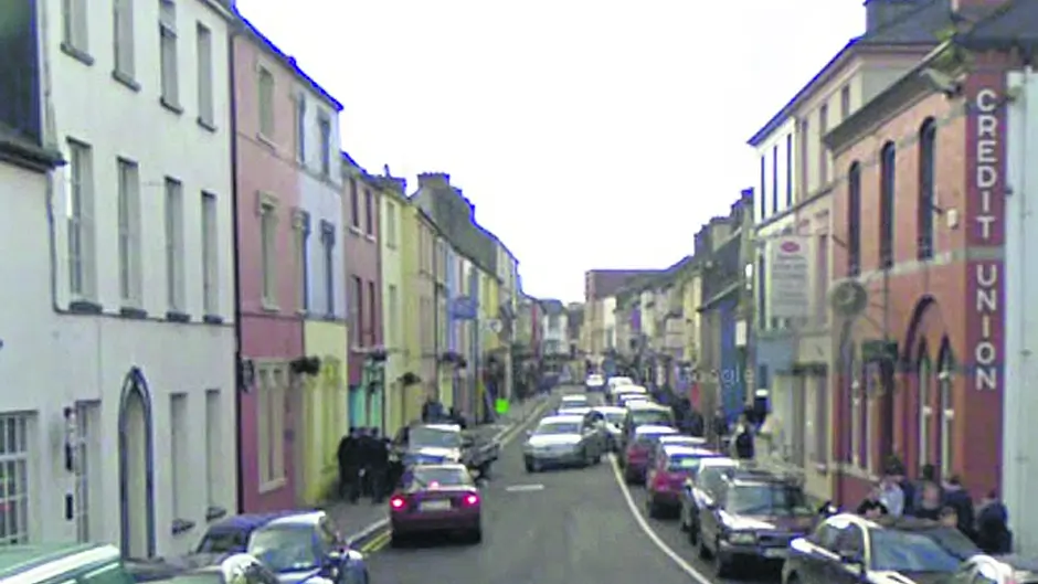 Cars being damaged on narrow Skibb street Image