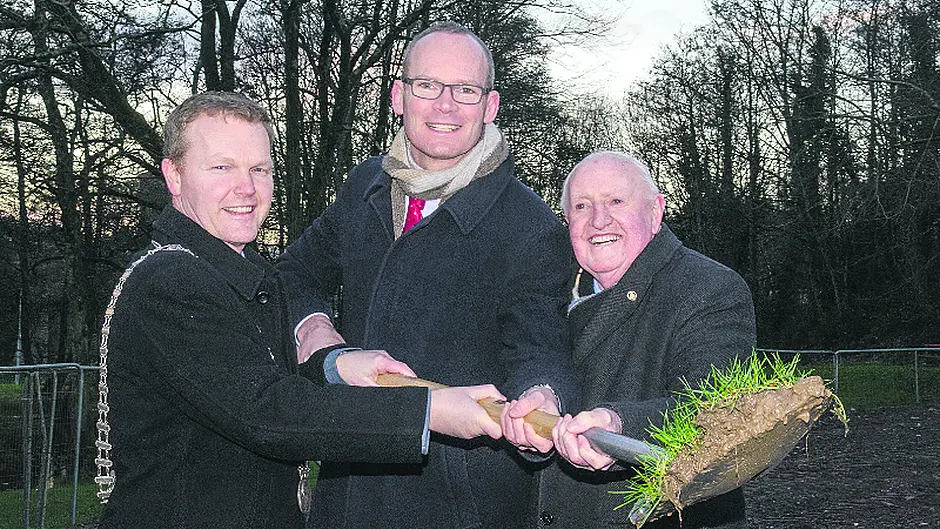 Minister Coveney turns sod on Carrigaline's new Men's Shed Image