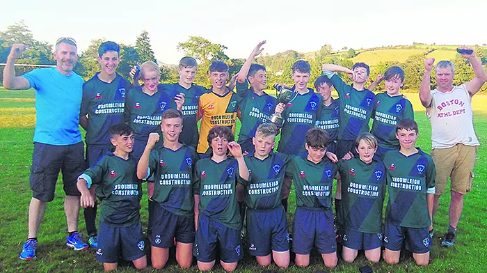 Eoghan's goals seal title triumph Image