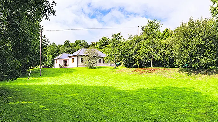 A river runs through it and a veranda wraps around this ‘gem' Image