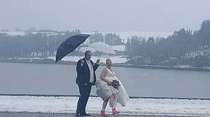 A case of all white on the day as four weddings go ahead despite weather Image