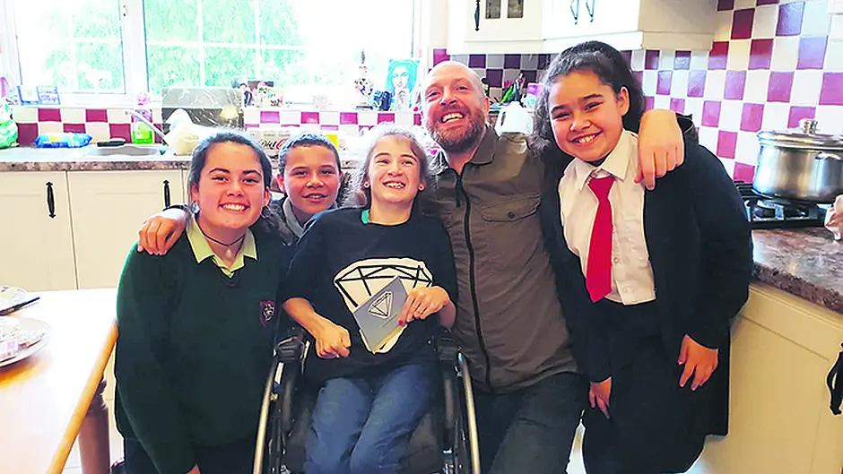 Singer Brian's good deed-y for his number one fan Jennifer Image