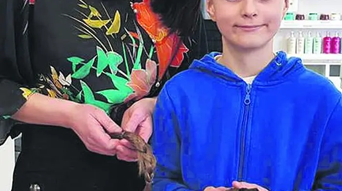 Alex donates hair to charity for kids' wigs Image